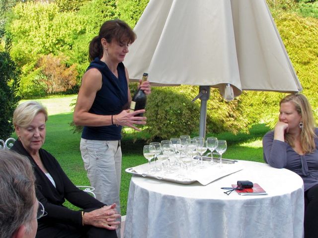 kathy pouring aperitif custom bike tours